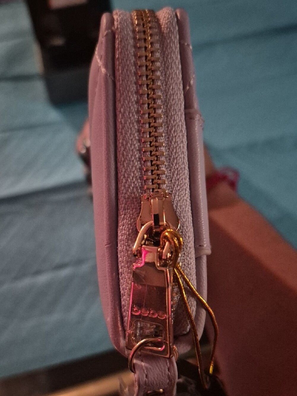 bebe Quilted Wristlet in Purple      Lilac with Gold Logo - Picture 5 of 6